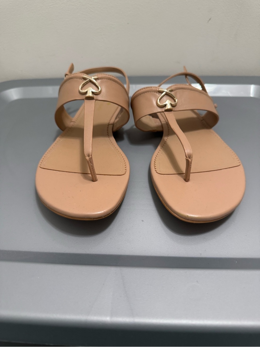 kate spade Nude T-Strap Sandals with Gold Spade Accent